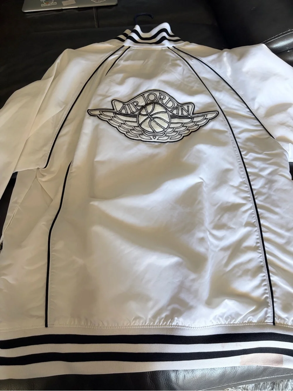 Jordan White Jacket with Black Collar Stripe and Red Jumpman Tag